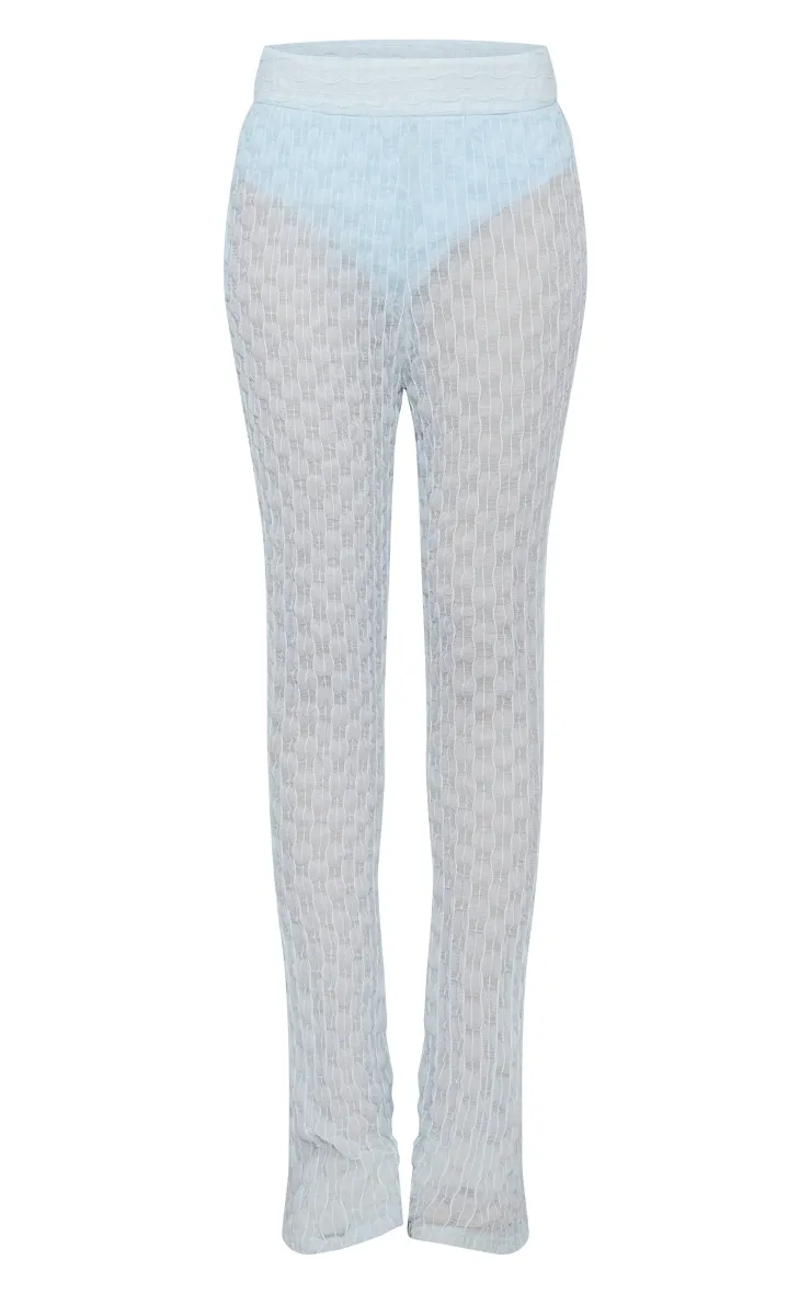 Pantalon évasé en mesh texturé bleu clair à taille haute détail string